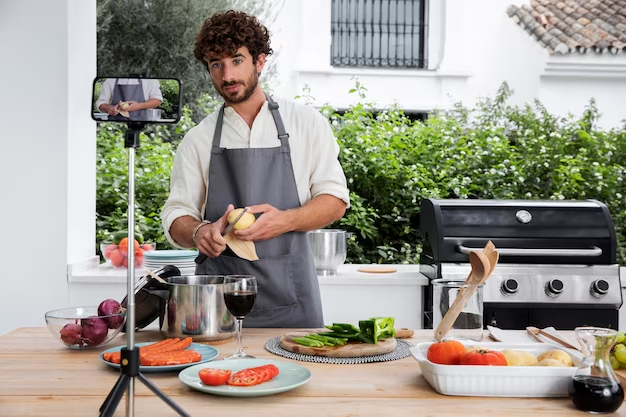 A food blogger capturing the preparation of a mouthwatering dish.