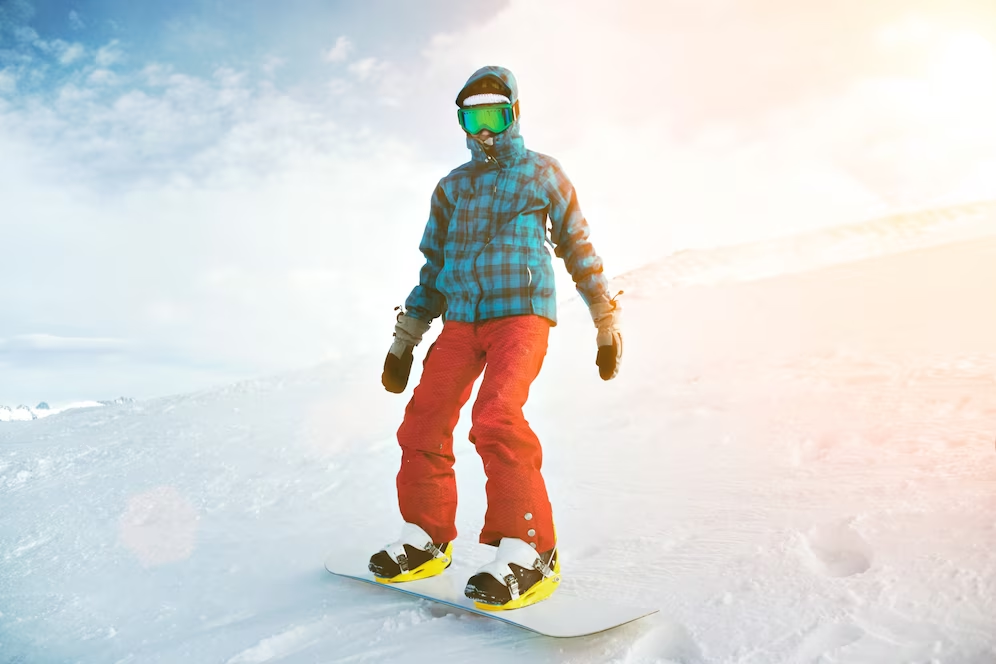 Image of a person fully geared up and skiing.