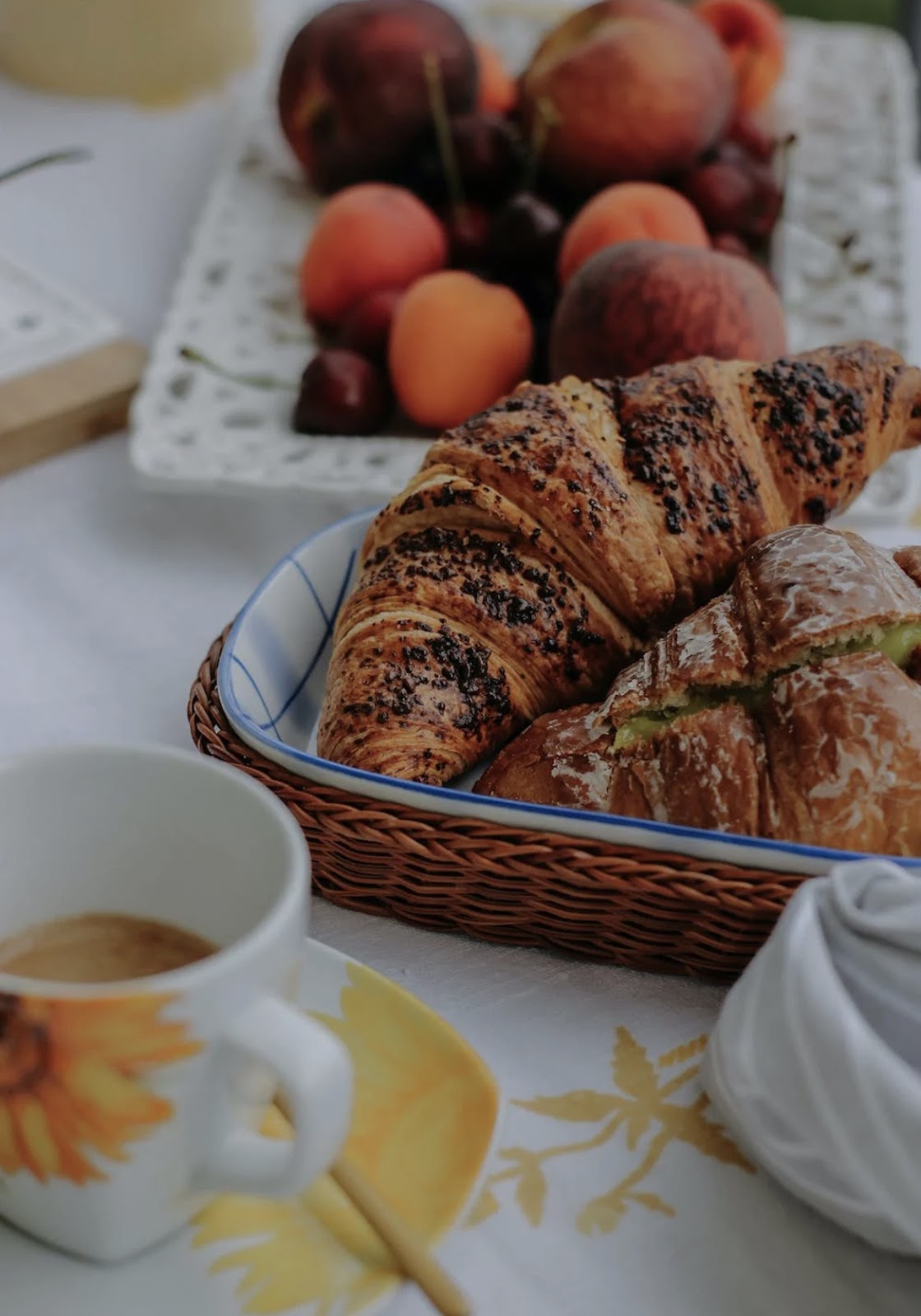 Food on the table – fruits and croissants